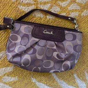 Purple signature Coach wristlet